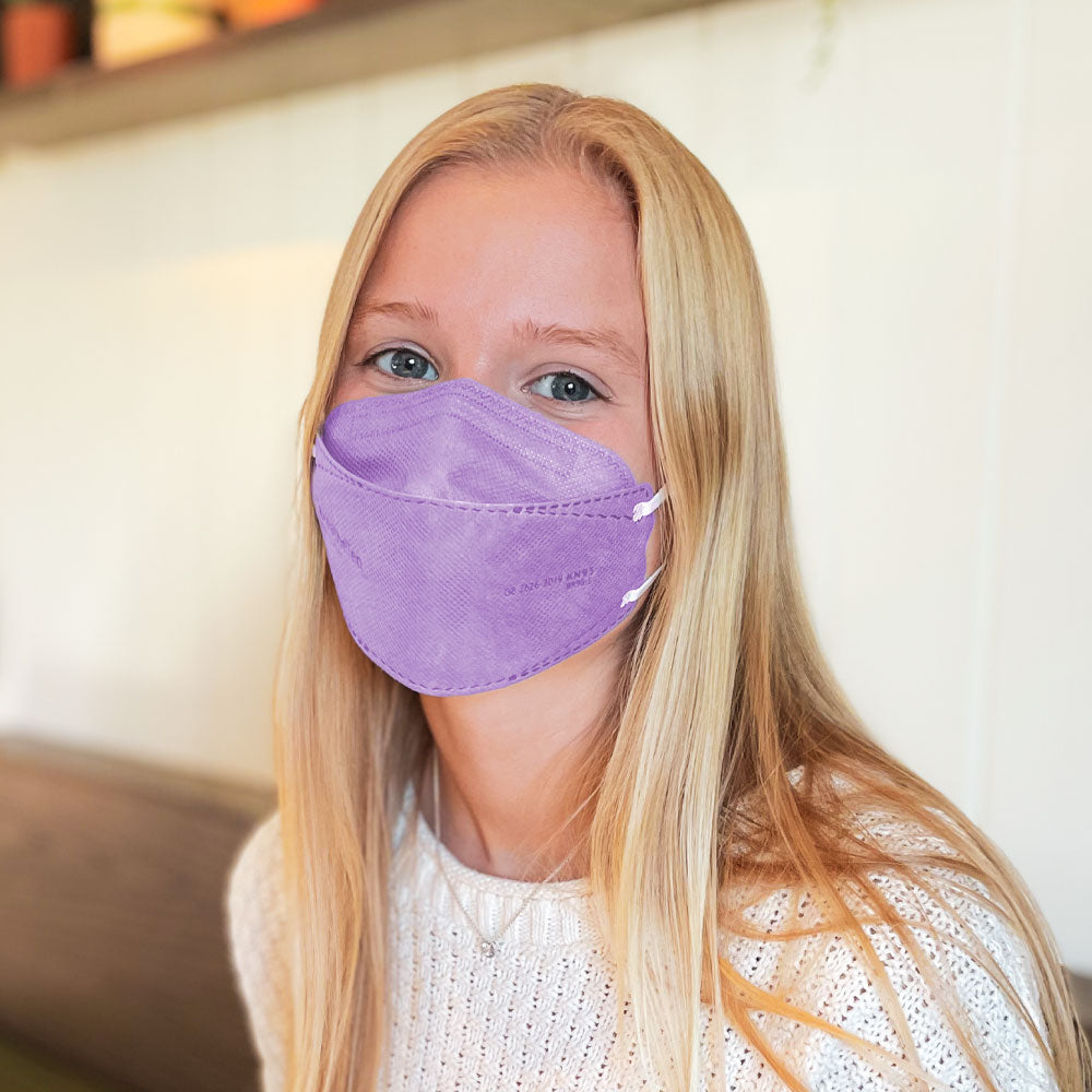 Young woman teen petite wearing BreatheTeq KN95 small lavender purple pink Canada Masq respirator mask made in canada