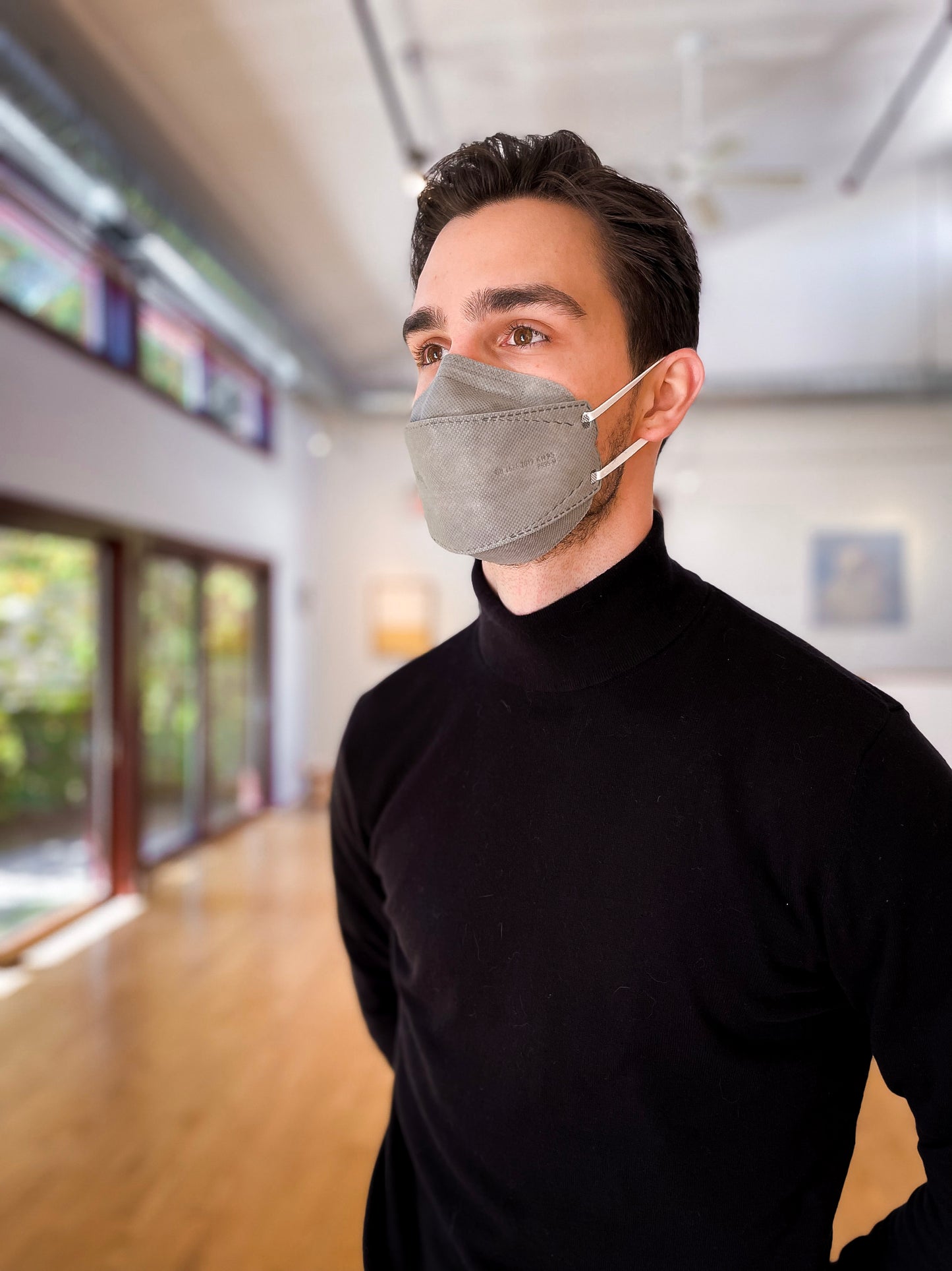 Man in office professional wearing BreatheTeq KN95 medium grey Canada Masq respirator mask from Canada Strong